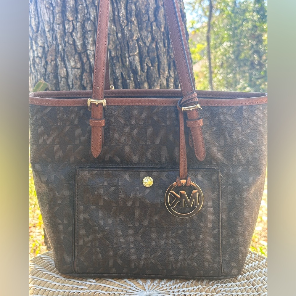 Michael Kors Signature Brown Leather Jet Set Snap Pocket front Tote Bag